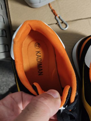 Zapatillas deportivas hombre negro y naranja