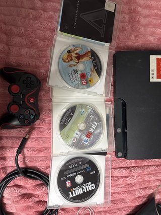 PlayStation 3 Slim Negra + 3 Juegos