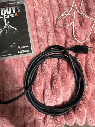 PlayStation 3 Slim Negra + 3 Juegos