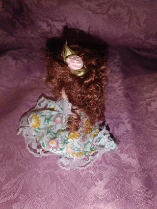 Muñeca de porcelana antigua