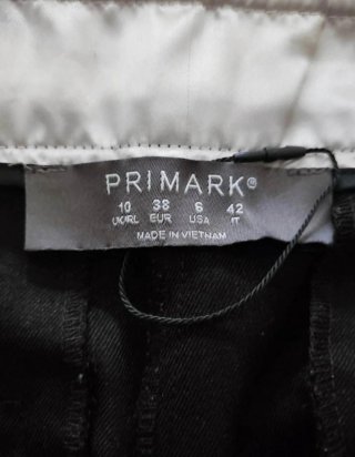Pantaloni neri a gamba larga