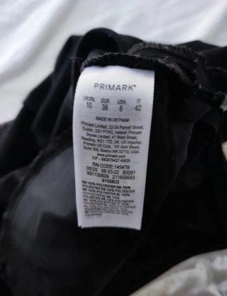 Pantaloni neri a gamba larga