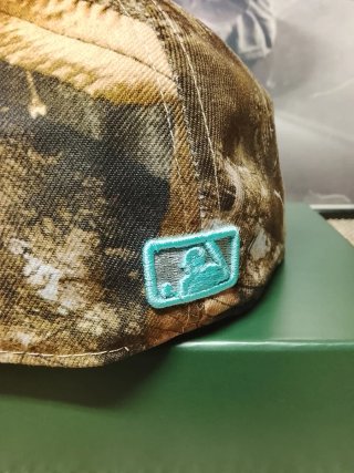 Gorra New Era 59Fifty Camuflaje y Teal Talla7.1/4