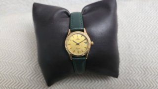 Reloj Omega de Oro con Correa Verde