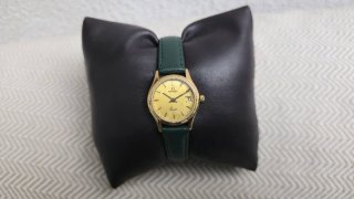 Reloj Omega de Oro con Correa Verde