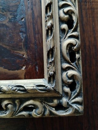 Antica cornice dorata traforata