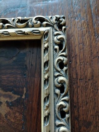 Antica cornice dorata traforata