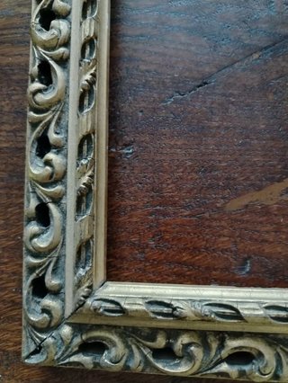 Antica cornice dorata traforata
