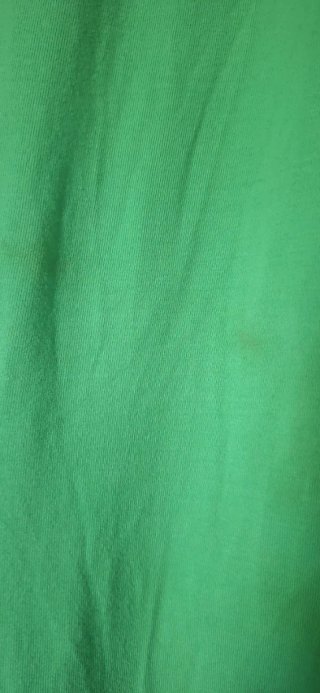Pantaloni sportivi Puma verdi con dettagli viola