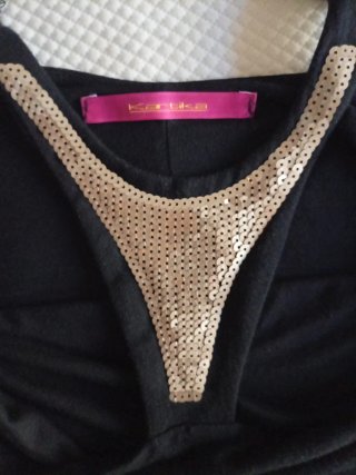 Top Kartika nero con paillettes scollo americano