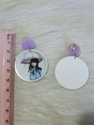 Pendientes niña paraguas lluvia