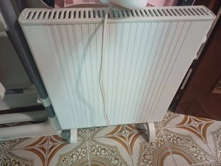 Calefactor blanco en buen estado