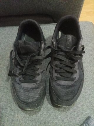 Zapatillas Nike niño negras