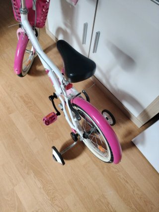 Bicicleta infantil rosa con ruedines 16"