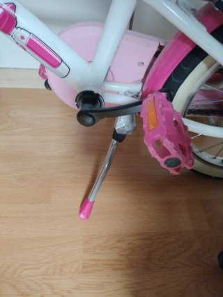Bicicleta infantil rosa con ruedines 16"