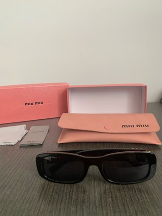 Gafas de sol Miu Miu Negras