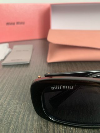 Gafas de sol Miu Miu Negras