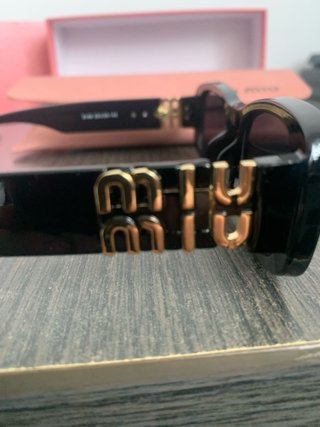 Gafas de sol Miu Miu Negras