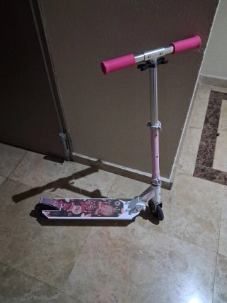 Patinete infantil rosa y blanco