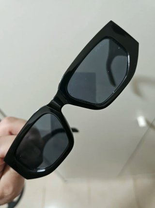 Gafas de sol Prada Triángulo Negro Dorado