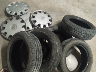 4 Tapacubos Opel R14 con 5 ruedas Casi nuevas