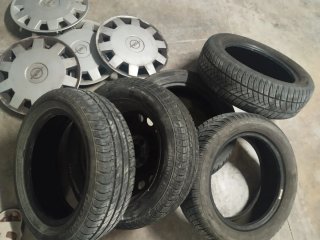 4 Tapacubos Opel R14 con 5 ruedas Casi nuevas