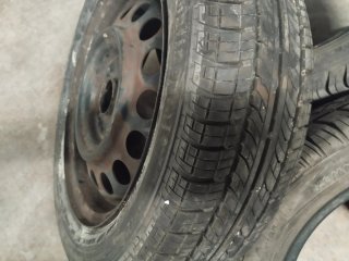 4 Tapacubos Opel R14 con 5 ruedas Casi nuevas