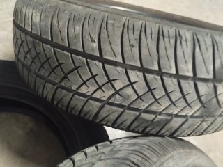 4 Tapacubos Opel R14 con 5 ruedas Casi nuevas
