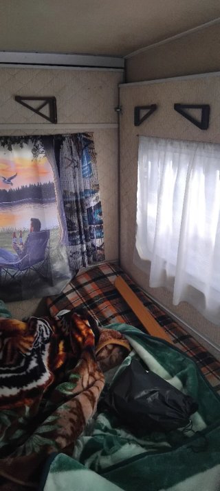 Caravana plegable con cama matrimonio y cama de 90