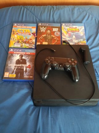 PS4 (PlayStation 4) + 4 Juegos Precio negociable