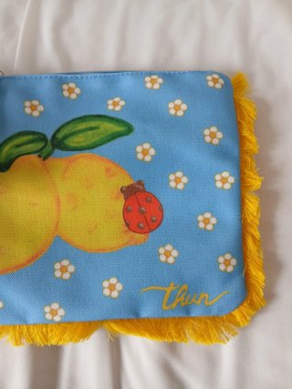 Pochette Thun con limoni e coccinella