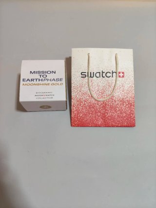 OMEGA SWATCH Earthphase Moonshine Gold NUOVO