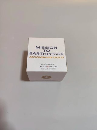 OMEGA SWATCH Earthphase Moonshine Gold NUOVO