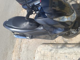 Moto Scooter Negra y Gris