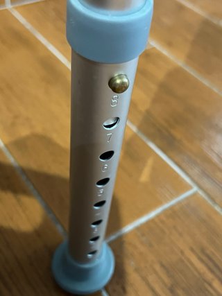 Silla de ducha blanca de plástico