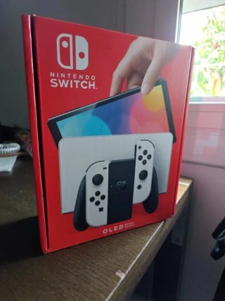 Nintendo Switch OLED 64GB + Mario Kart + SD 512GB