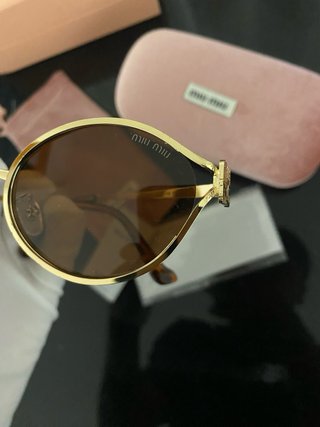 Gafas de sol Miu Miu rosa degradado con estuche