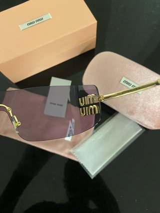 Gafas de sol Miu Miu rosa degradado con estuche