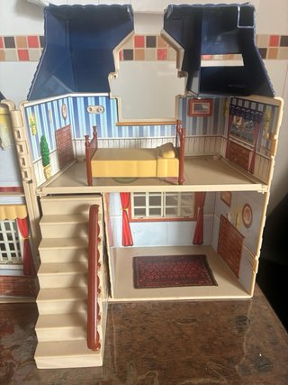 Casa de muñecas de juguete