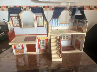 Casa de muñecas de juguete