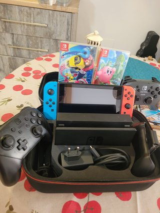 Nintendo Switch + 2 Mandos + 2 Juegos