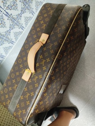 Maleta Louis Vuitton Beige