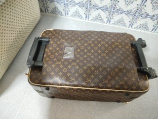 Maleta Louis Vuitton Beige