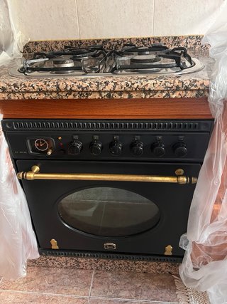 Placa de gas 4 fuegos y horno eléctrico