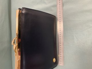 Elegante bolso de señora azul y dorado