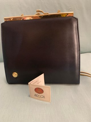 Elegante bolso de señora azul y dorado