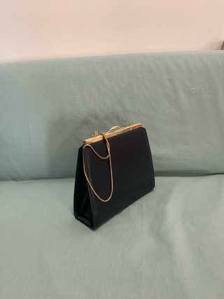 Elegante bolso de señora azul y dorado