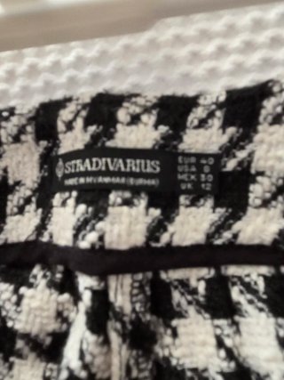 Pantalón campana estampado pata de gallo