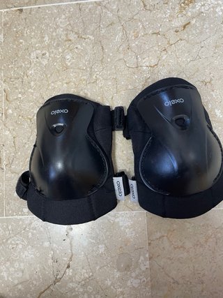 Patines en línea negros y rosas