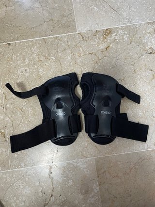 Patines en línea negros y rosas